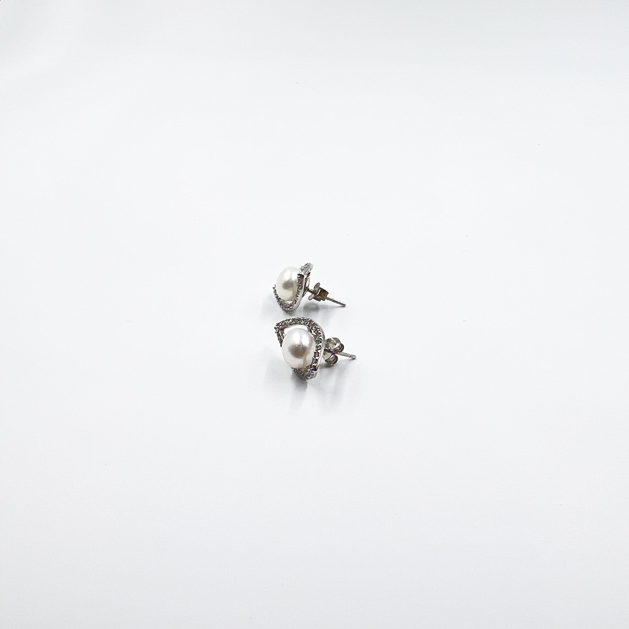 14 An evil eye pearl studs from ekatvajewls