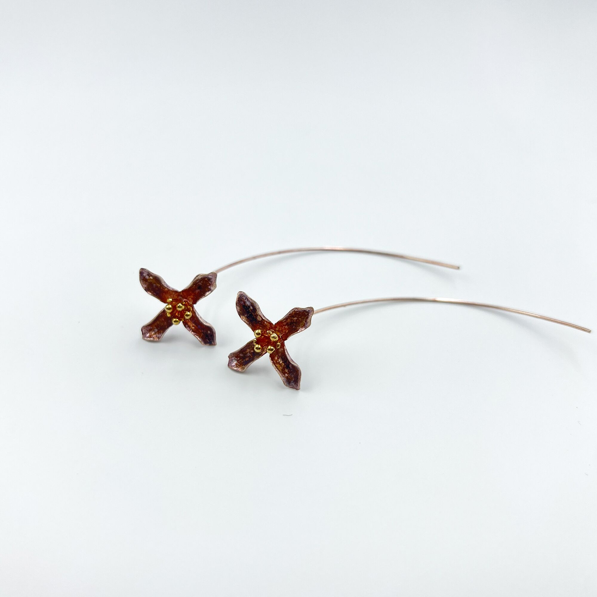 146 A boquuet of flower earrings from ekatvajewls