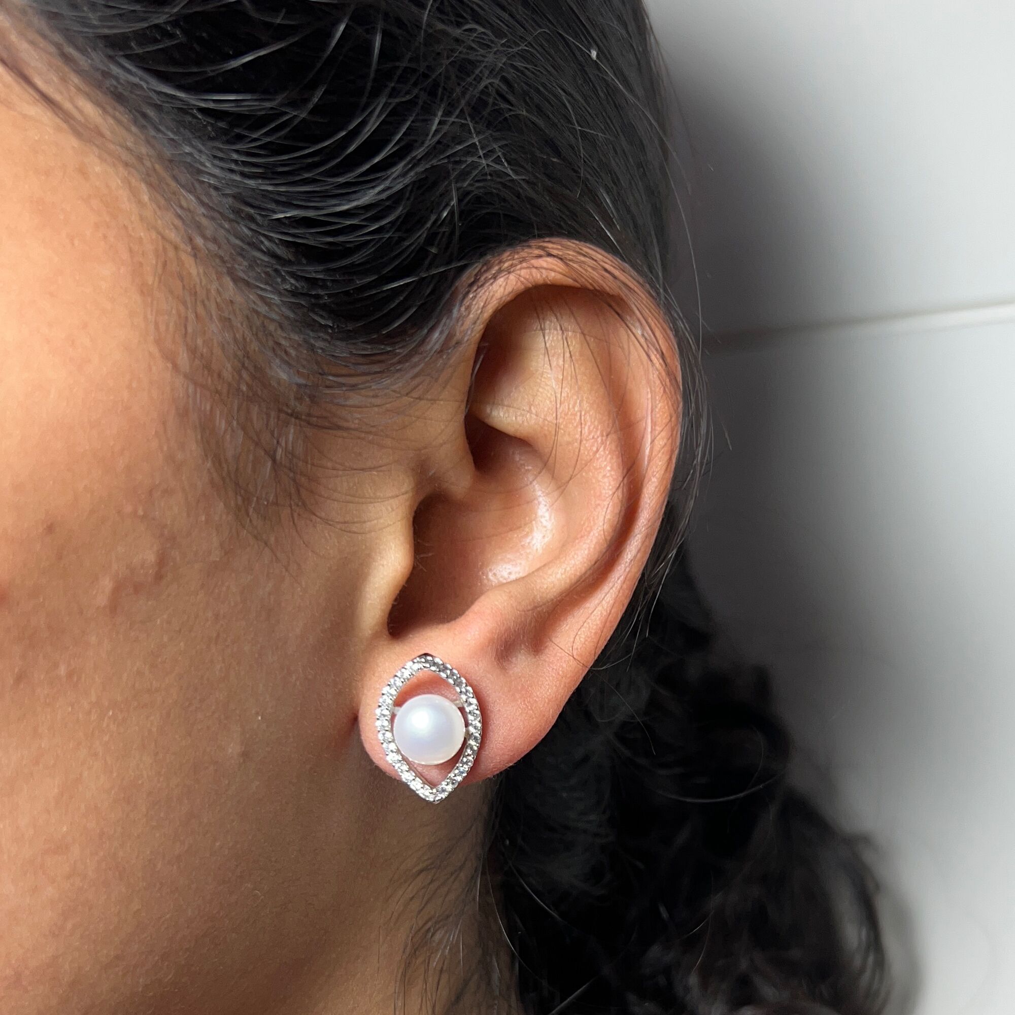 15 An evil eye pearl studs from ekatvajewls
