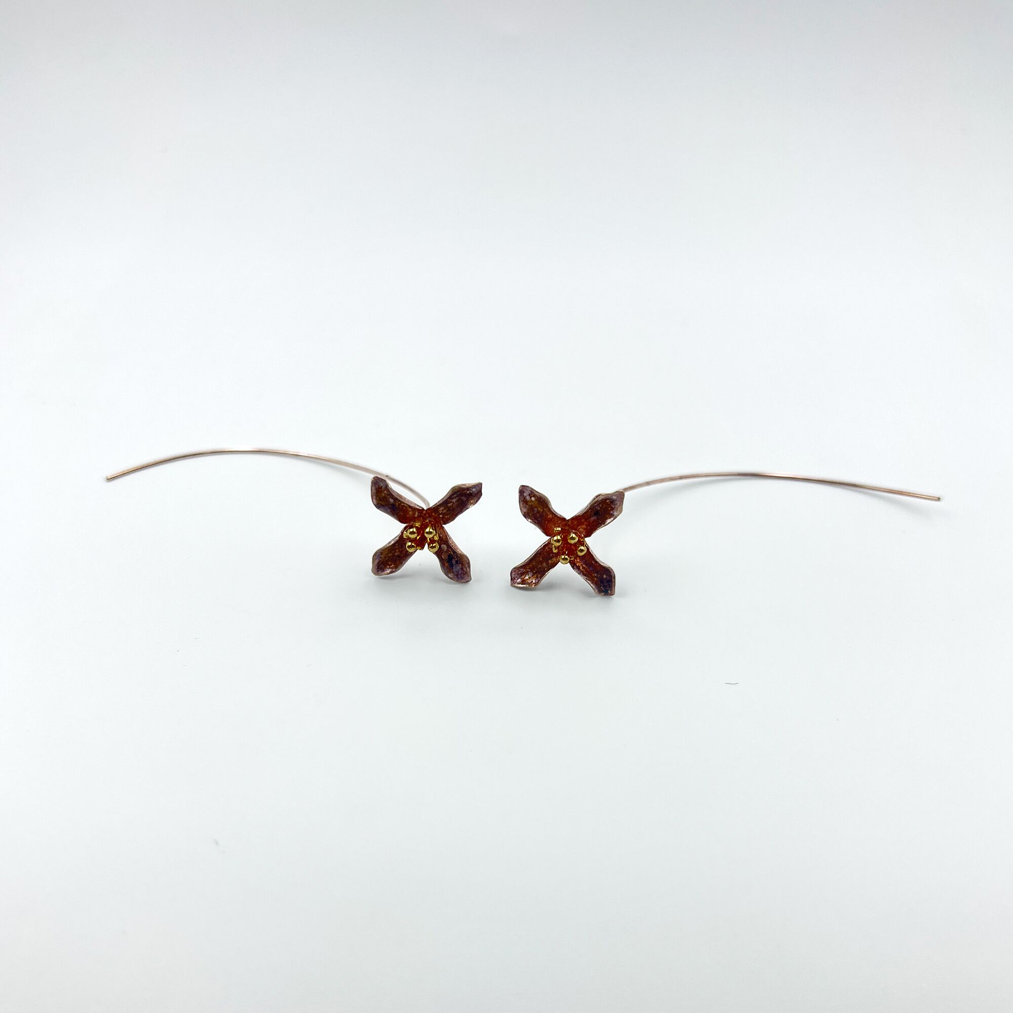 A boquuet of flower earrings from ekatvajewls