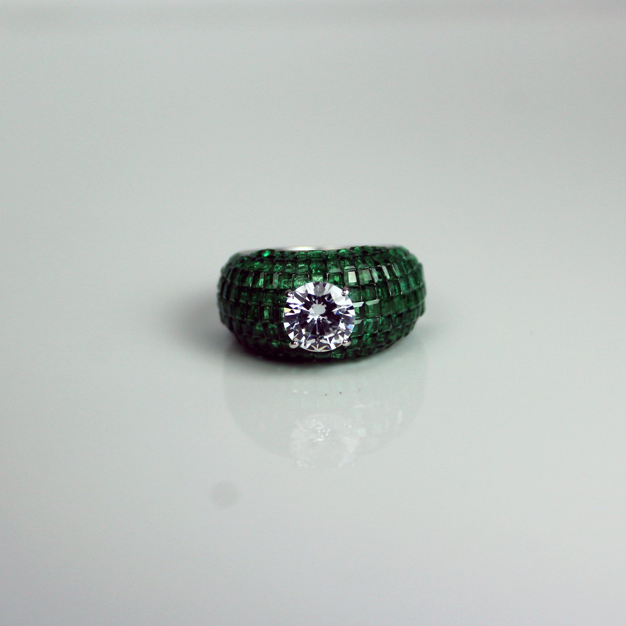 Invisible emerald setting ring from ekatvajewels